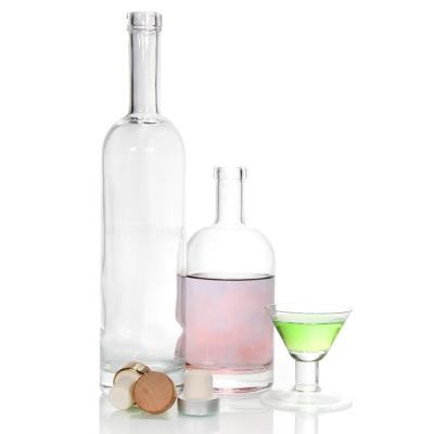 China Recycled Glass 700ml Spirit Bottles Round Flint Empty Liquor Bottles for sale