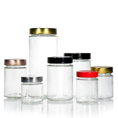 China Duidelijke ronde 4oz 8oz 16oz 12oz 20oz glazen pot glazen voedselcontainer met diep metaal deksel Te koop