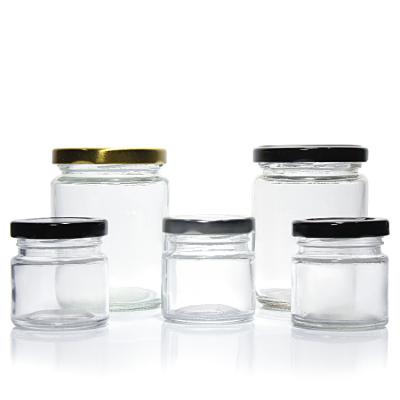 China Custom Luxury 100ml 180ml 500ml Small Round Freezing Glass Jar For Storing Pickle for sale