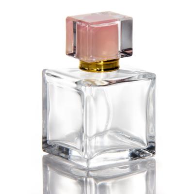 China 30 Ml 50ml 100ml Square Hexagon Perfume Bottles Crystal Cap With Pump Sprayer On Glass Bottle for sale