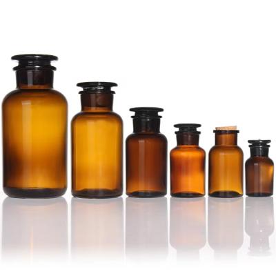 中国 Amber 250ml Reagent Bottle Brown Glass Jars Wide Mouth With Stopper 販売のため