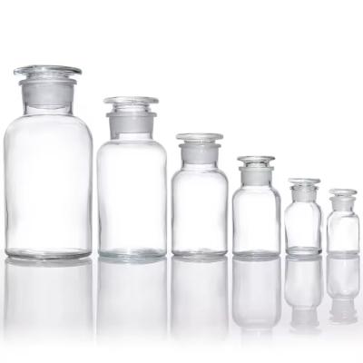 中国 60ml 250ml 500ml Round Clear Wide Mouth Reagent Glass Bottle With Lids 販売のため