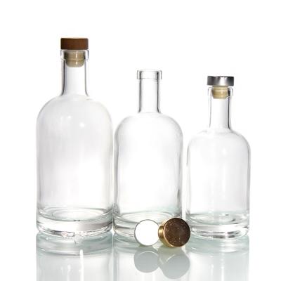 Chine Bouteilles en verre transparent pour les boissons à vin et boissons avec bouchon de liège Bouteilles à couvercle hermétique fournisseur 500 ml 750 ml à vendre