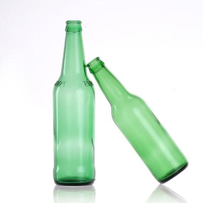 China Empty Amber Green Alcohol Glass Beer Bottles with Crown Caps for sale