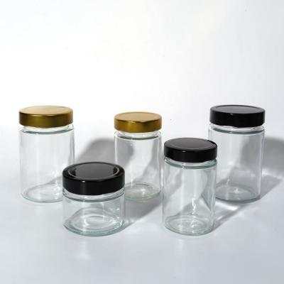 China Food Factory Use 1Oz 4Oz 8Oz Round Shaped Clear Empty Storage Container Glass Jelly Jam Honey Sauce Jar for sale