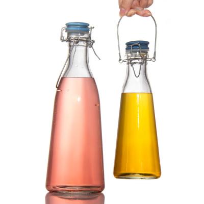 China Empty 250ml 500ml 750ml Glass Bottle with Easy Swing Snap Cap For Beverage Juice Beer Vodka Whiskey for sale