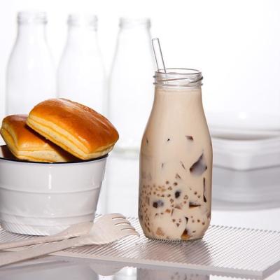 China Lead Free French Round 25Oz 32Oz Glass Fresh Milk Bottles For Iced Drinks zu verkaufen