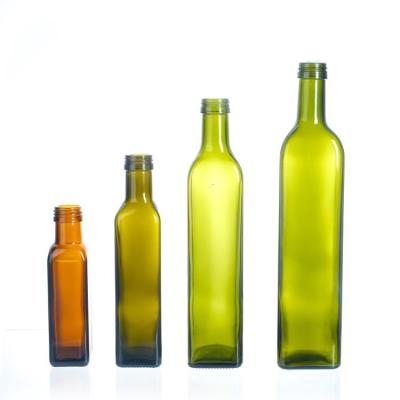 China In Stock 250Ml 500Ml 750Ml Round Glass Oil Bottles With Lid for sale