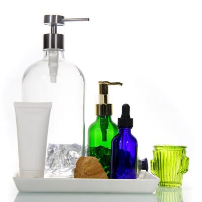 中国 Empty Amber Glass Lotion Pump Bottles Soap Dispensers Bottle Jar Cosmetics Containers 販売のため