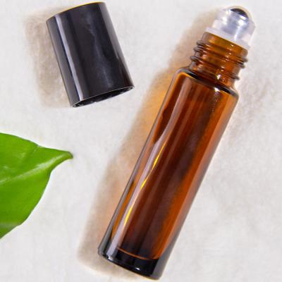 China Botella de vidrio de cristal negro transparente de 10 ml para aceites esenciales de perfumes en venta