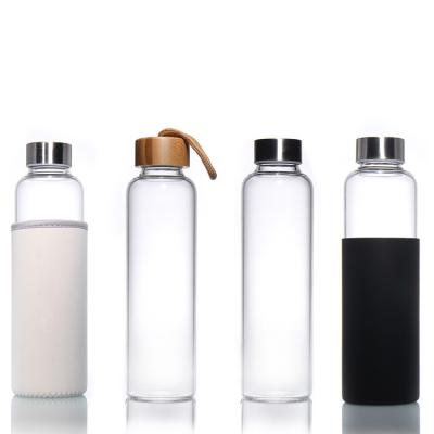 China Outdoor 35ml 500ml Round Sports High Borosilicate Glass Water Bottle With Silicone Sleeve for sale