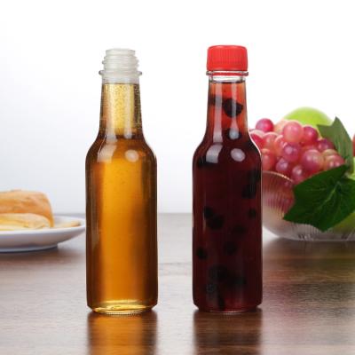 China Factory Wholesale 5 Oz 8 Oz Woozy Bottles Ketchup Pepper Sauce Glass Bottle With Pp Lid for sale