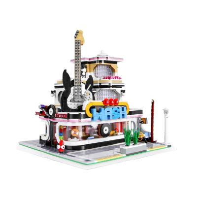 China Kid Toys Playing Blocks Hot Sales Die King 3d House 16002 Guitar Shop Full Set Light Up Building Blocks For Kids Birthday Gifts for sale