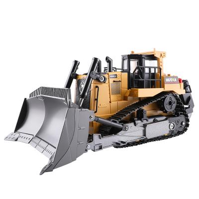 China Bulldozer Blade Rotates 360 Degree Hot Sale Huina 1:16 9 Channel Alloy RC Bulldozer Construction Cars Model Toy For Kids for sale