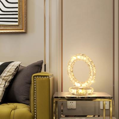 China Hot Sale Modern Creative Circle Crystal Lamp Stainless Steel Heart Shaped Table Lamp For Bedroom Bedside for sale