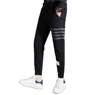 China Spandex Polyester Elastic Waist Popular Sportswear Mens Slim Fit Joggers for sale