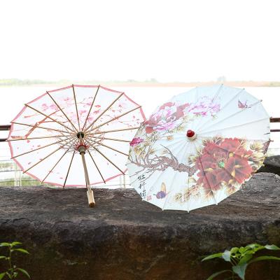 China Chinese Traditional Chinese Handmade Parasol Folded Oil Paper Umbrellas For Wedding for sale