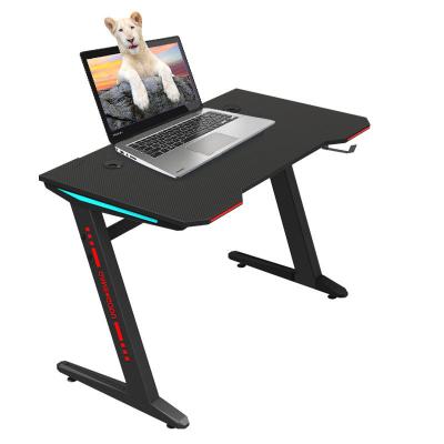 China RGB Convertible Customs Desk Racing Table Gamer Computer Gaming Desk Table for sale