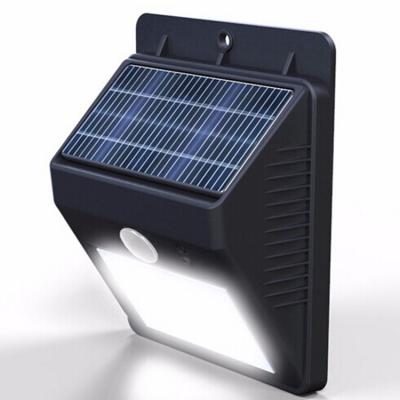 China Outdoor Solar Powered Garden Wall Lamp Fence Motion Sensor Outdoor Garden Led Solar Light for sale