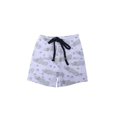 China New Summer Breathable Warm Kids White Printing Loose Drawstring Boutique Kids Swimming Pants for sale