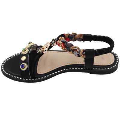 China Fashion trend simple classics flower cross sandals decoration strap summer party wear flat sandals women women for sale