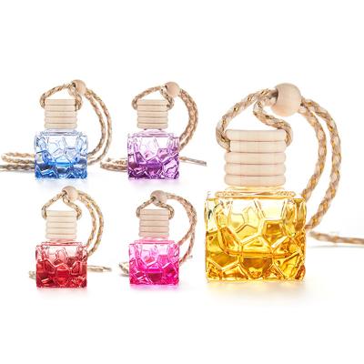 China Eco-friendly Recyclable Wooden Diffuser 8ml Wholesale Wooden Empty Glass Cap Car Hanging Hanging Perfume Bottle for sale