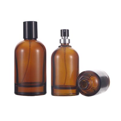 China Cylinder Amber Empty Glass Perfume Bottle 50ml Capacity 100ml 30ml Recyclable And Eco-friendly Perfume Bottle for sale