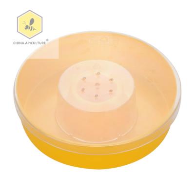 China Farms Beekeeping Tools 1.2L Plastic Quick Round Bee Feeder Bee Water Feeder for sale