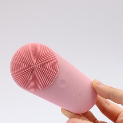 China New Vibration Face Acne Treatment Silicone Cleansing Brush Cordless Rechargeable Waterproof Electric Handy Ultrasound Facial Massager for sale