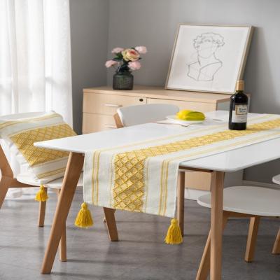 China Luxury Single Stripe Table Runner Boho Decoration Meal Flag Home Table Runner Fancy With Tassel Pendant For Dining Table for sale