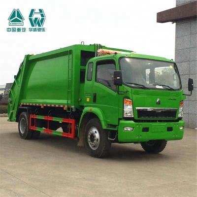 China Green Compactor Garbage Truck / Diesel Fuel Garbage Collection Trucks for sale