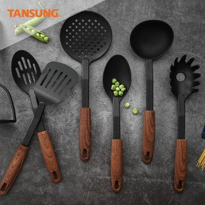 China Sustainable Success 7pcs Black Nylon Kitchen Tools And Uses Kitchen Cookware Set for sale