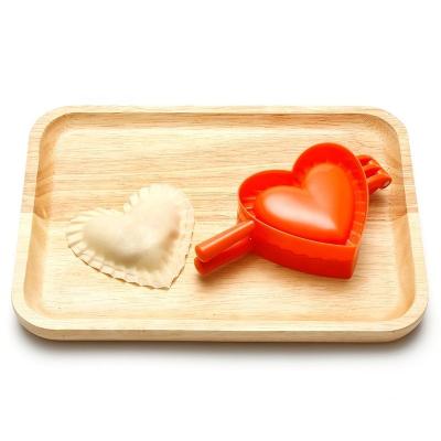 China Sustainable Food Grade 3 Pcs Multi Functional Heart Form Kitchen Gadgets Plastic Dumpling Mold for sale