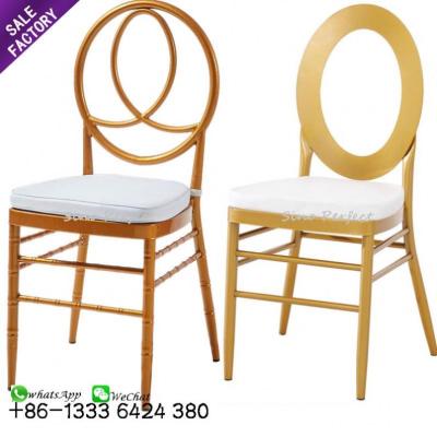 China Factory Price Wedding Decoration Supplies Modern Stackable Gold Steel Phoenix Chairs for sale