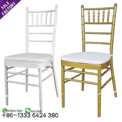 China Modern Event Supplies White Steel Furniture Gold Tiffanychairs With Cushion For Wedding for sale