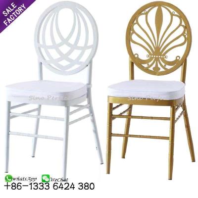 China Manufacturer New Contemporary Design Gold White Metal Stacking Wedding Event Phoenix Chair With Cushion For Rental for sale