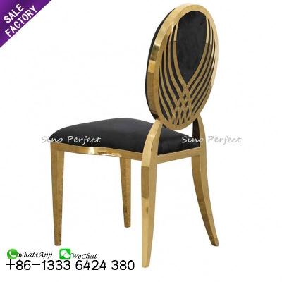 China Modern Wholesale Stainless Steel Frame Wedding Hotel Furniture Chair Round Back Carve Leather Dining Chair for sale