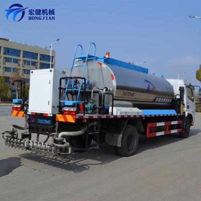 China Construction worksÂ   Bitumen Paver Asphalt Distributor Trailer With Conducting Oil Heating System for sale