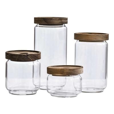 China Hot Selling Acacia Wood Airtight Container Kitchen Luxurious Material Spice Storage Glass Jar With Black Wooden Lid for sale