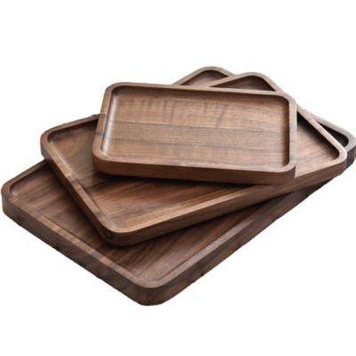 China Black Walnut Wood Factory Manufactures Custom Logo Black Walnut Wood Food Pizza Serving Tray for sale