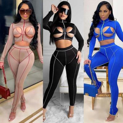 China 2022 new design women's viable sexy two-piece set crop stretch hollow top and high waist pants boutique team Lucky Label for sale