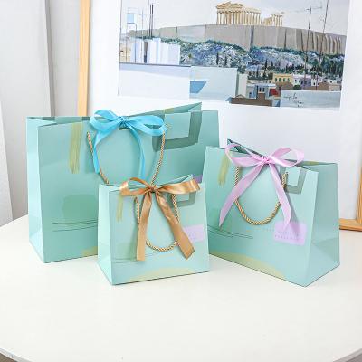 China Handmade Wholesale Gift Paper Bag Can Custom Size Birthday Gift Bag E144 for sale