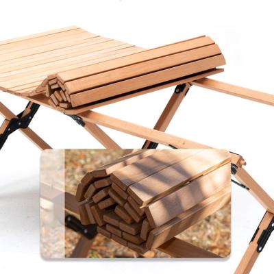 China Multifunctional Portable Foldable Camping Egg Roll Picnic Table Easy Carry Beech Wooden Outdoor Bench for sale