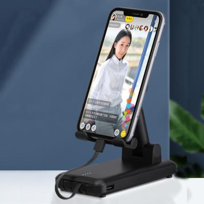 China Power Show 3 Output Lines Angle Adjustable Output Four Wire Angle Display Power Bracket Bracket With 3 Multifunction Portable Folded To 1power Bank for sale