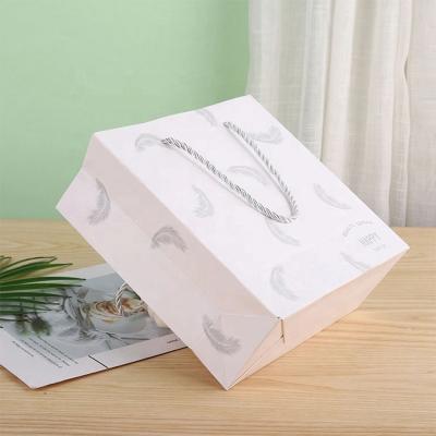 China Recycled Materials Custom Luxury Shopping Paper Bag for sale