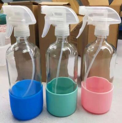 China Factory Price 8oz 16oz Boston Round 250ml 500ml Trigger Spray Cosmetic Refillable Glass Bottle With Silicone Sleeve for sale