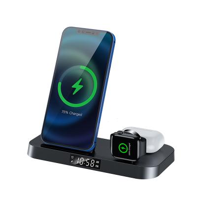 China 4 in 1 Wireless Foldable Wake Up Station Charger Wireless Charger 3 in 1 15W QI Fast Charging Nightstand Charging Station for sale