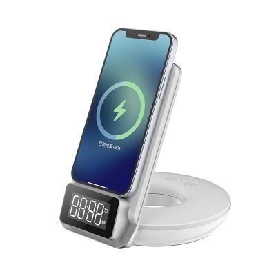 China Qi 15w Mobile Phone Alarm Clock Charger Sensor Wireless Charger Stand Smart Foldable Wireless Fast Charging for sale