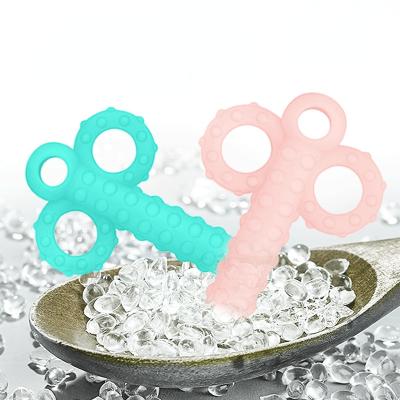 China Soft Toy Wholesale 3-6-12 Months Food Grade Silicone Safe Key Baby Teether Molar Toys for sale