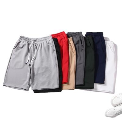 China Hot Custom Men's Fitness Casual Beach Running Sports Summer QUICK DRY Logo Shorts With Pockets for sale